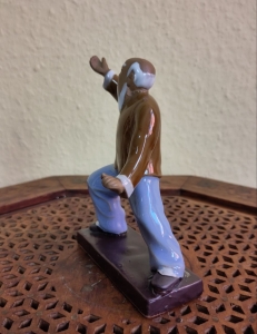 Tai Chi Figur - Mähne des Wildpferds teilen